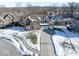 Two-story house with attached garage and snow-covered yard at 6711 Colville Pl, Indianapolis, IN 46236