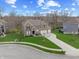 A beautiful home with a well-kept lawn, mature trees, and a two-car garage at 6711 Colville Pl, Indianapolis, IN 46236