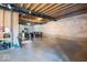 Unfinished basement with concrete floor and exposed beams at 6711 Colville Pl, Indianapolis, IN 46236