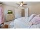 Light and airy bedroom with a comfortable bed and plenty of closet space at 6711 Colville Pl, Indianapolis, IN 46236