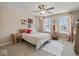 Charming bedroom with a cozy bed and large windows at 6711 Colville Pl, Indianapolis, IN 46236