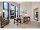 Two-story Gathering room with a fireplace and large windows at 6711 Colville Pl, Indianapolis, IN 46236