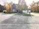 Two-story brick house with attached garage and landscaping at 6711 Colville Pl, Indianapolis, IN 46236