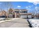 Two-story brick home with attached two-car garage at 6711 Colville Pl, Indianapolis, IN 46236