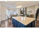 Open concept kitchen with island and view into Gathering room at 6711 Colville Pl, Indianapolis, IN 46236