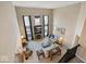 Two-story living room with fireplace and ample natural light at 6711 Colville Pl, Indianapolis, IN 46236