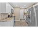 Modern kitchen with stainless steel appliances at 6731 W 15Th St, Indianapolis, IN 46214