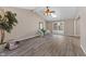 Sun-drenched living room with hardwood floors and vaulted ceiling at 6731 W 15Th St, Indianapolis, IN 46214