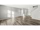 Bright living room with hardwood floors and neutral walls at 8103 Grove Berry Way, Indianapolis, IN 46239