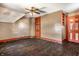 Upstairs bedroom with hardwood floors and built-in shelving at 857 S Tompkins St, Shelbyville, IN 46176
