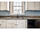 Kitchen sink and countertop detail with white cabinets and a modern faucet at 857 S Tompkins St, Shelbyville, IN 46176