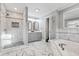 Elegant bathroom featuring a soaking tub, shower, and double vanity at 8810 W Tulip Tree Dr, Muncie, IN 47304