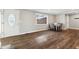 Bright dining area with hardwood floors and table set for a meal at 8810 W Tulip Tree Dr, Muncie, IN 47304