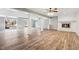 Spacious living room with hardwood floors and a fireplace at 8810 W Tulip Tree Dr, Muncie, IN 47304