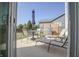 Outdoor patio setup with dining table, chairs, grill, and lounge chairs, perfect for entertaining at 1001 Parker Ln, Westfield, IN 46074