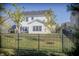 Well-maintained backyard featuring a black metal fence and manicured lawn at 1001 Parker Ln, Westfield, IN 46074