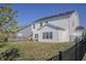 Spacious fenced backyard with patio and lawn, perfect for outdoor entertaining at 1001 Parker Ln, Westfield, IN 46074