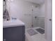 Modern bathroom featuring a gray vanity, glass-enclosed shower, and sleek fixtures at 1001 Parker Ln, Westfield, IN 46074