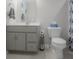 Well-lit full bathroom with a sleek single sink vanity, modern fixtures, and a toilet at 1001 Parker Ln, Westfield, IN 46074