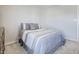 Cozy bedroom with plush carpeting, neutral walls, and a comfortable bed at 1001 Parker Ln, Westfield, IN 46074