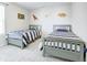 Bright, cheery bedroom with two beds, carpet and fun decor at 1001 Parker Ln, Westfield, IN 46074