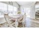 Bright dining area with large windows and sliding glass door, perfect for Gathering meals at 1001 Parker Ln, Westfield, IN 46074