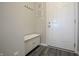 Clean, bright entryway with a bench and coat hooks for added convenience at 1001 Parker Ln, Westfield, IN 46074