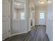 Bright entryway showcasing hardwood floors, natural light, and access to the living area and closet at 1001 Parker Ln, Westfield, IN 46074