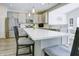 Spacious kitchen with a large island, stainless steel appliances, and sleek countertops, perfect for cooking at 1001 Parker Ln, Westfield, IN 46074