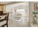 Bright eat-in kitchen and dining area showcasing modern finishes and wood-style floors at 1001 Parker Ln, Westfield, IN 46074