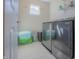 Convenient laundry room with modern washer and dryer, plus storage space at 1001 Parker Ln, Westfield, IN 46074