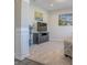 Open-concept living room featuring neutral tones, artwork, and views into other living spaces at 1001 Parker Ln, Westfield, IN 46074