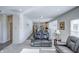 Inviting living area with neutral tones and plenty of natural light, seamlessly flowing into the kitchen at 1001 Parker Ln, Westfield, IN 46074