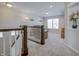 Loft area featuring neutral carpet, recessed lighting, and a large window for ample light at 1001 Parker Ln, Westfield, IN 46074