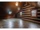 Spacious attic bedroom with wood walls and floors, skylight and two windows at 1084 Chipmunk Ln, Pendleton, IN 46064