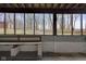 Walkout basement features a covered patio with wooded views at 1084 Chipmunk Ln, Pendleton, IN 46064