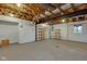 Unfinished basement with exposed beams, concrete floor, and shelving at 1084 Chipmunk Ln, Pendleton, IN 46064