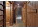 Hallway with wooden doors and walls at 1084 Chipmunk Ln, Pendleton, IN 46064