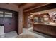 Rustic kitchen with wooden cabinets, island, and appliances at 1084 Chipmunk Ln, Pendleton, IN 46064