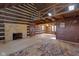 Spacious living room with a stone fireplace and loft at 1084 Chipmunk Ln, Pendleton, IN 46064