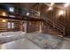 Open living area with a loft and wood-burning fireplace at 1084 Chipmunk Ln, Pendleton, IN 46064