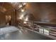 Bright loft bedroom with wood walls and flooring at 1084 Chipmunk Ln, Pendleton, IN 46064