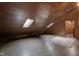 Open loft with wood walls and skylights at 1084 Chipmunk Ln, Pendleton, IN 46064