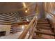 Wooden staircase leading to a loft area at 1084 Chipmunk Ln, Pendleton, IN 46064