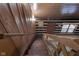 Wooden staircase with railings leading to upper level at 1084 Chipmunk Ln, Pendleton, IN 46064