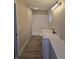 Updated bathroom with white vanity and walk-in shower at 117 Tracy Rd, Whiteland, IN 46184