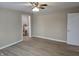 Spacious bedroom with hardwood floors and access to laundry facilities at 117 Tracy Rd, Whiteland, IN 46184