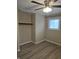Bright bedroom with ceiling fan and large closet at 117 Tracy Rd, Whiteland, IN 46184