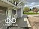 Cozy home exterior featuring a stone facade, covered porch, and landscaped front yard at 117 Tracy Rd, Whiteland, IN 46184