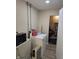 Unfinished laundry room with washer, dryer, and storage space at 117 Tracy Rd, Whiteland, IN 46184